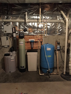 Solution Feeder, A Water Softener, A Sediment Filter, An Ultraviolet Disinfection Light, A Pressure Tank And A Sump Pump