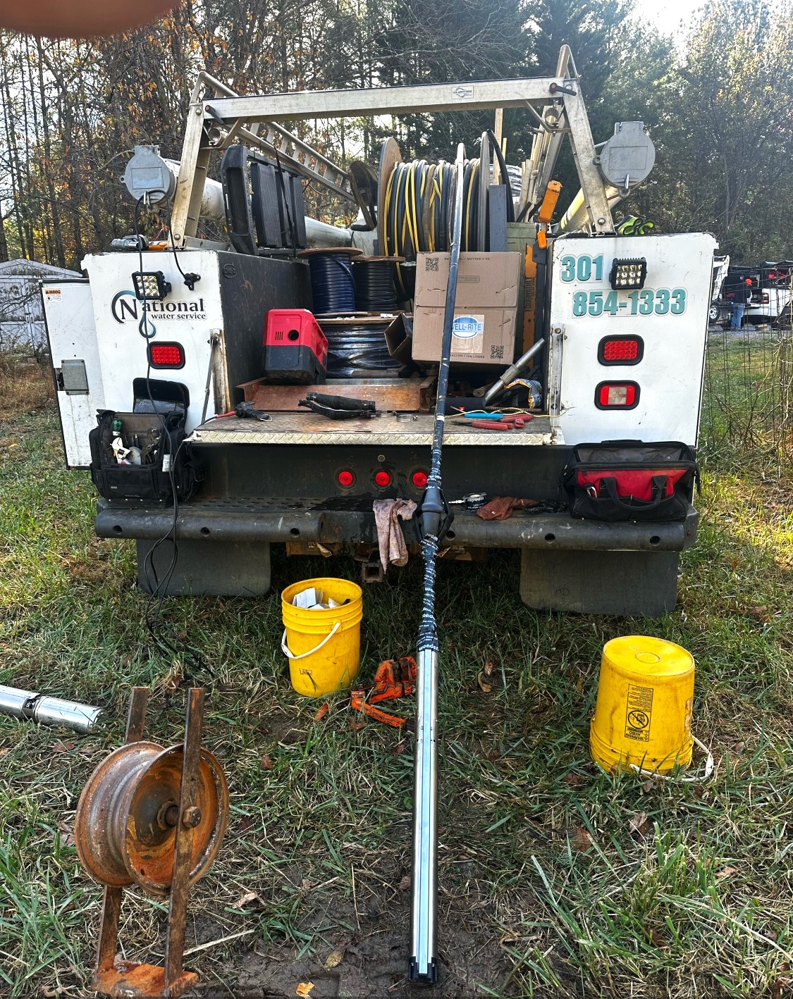 A Truck With Tools On The Back