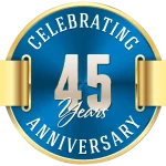 A Blue And Gold Circle With White Text And Gold Ribbon